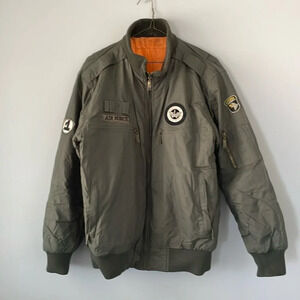 Oversize green army bomber jacket with pockets
